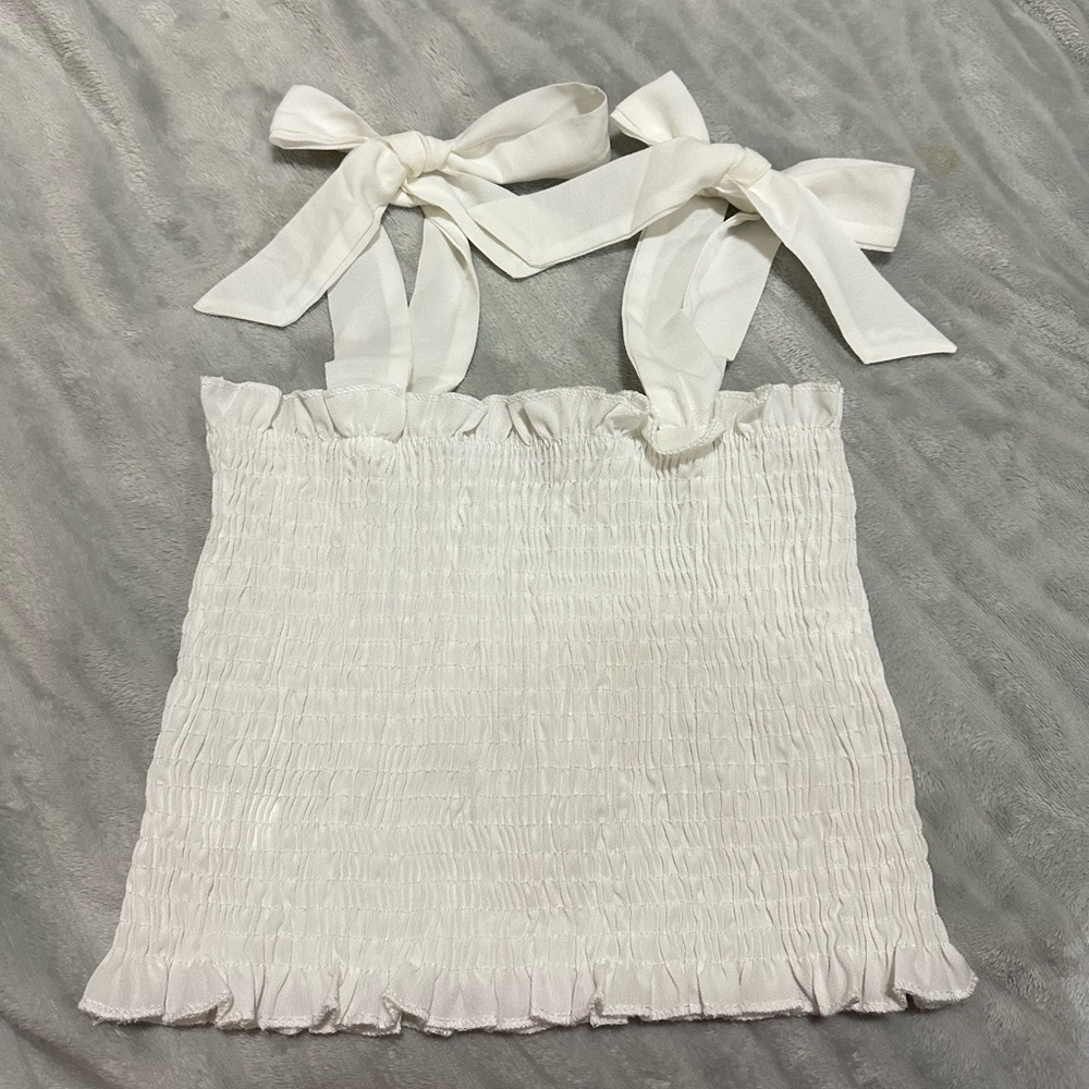 White ruffle top